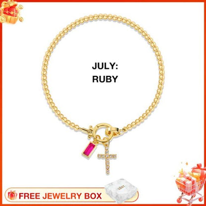 CelestiaFaith – Gold Cross Bracelet – July Ruby Cross Bracelet